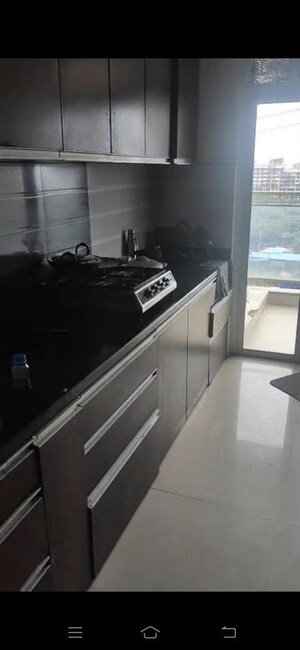Kitchen in 3 BHK Apartment at Omkar Veda Exclusive, Parel – for Rent