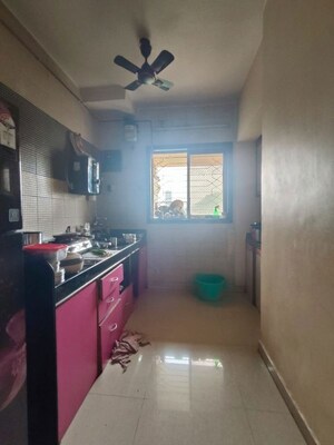 Kitchen in 2 BHK Apartment at Amrut Paradise, Kalwa – for Sale