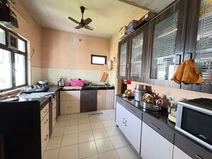 Kitchen in 2 BHK Apartment at Tata Glendale, Vasant Vihar – for Sale