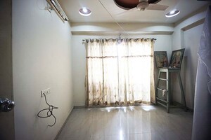 Living Room in 2 BHK Apartment at Sola – for Sale