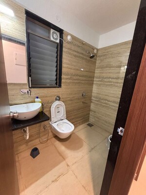 Bathroom in 3 BHK Apartment at Raga Top Towers, Wakad – for Rent