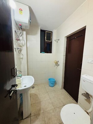 Bathroom in 3 BHK Apartment at Sushma Crescent, Dhakoli – for Rent