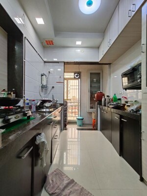 Kitchen in 2 BHK Apartment at Shree Krupa Keshav Heights Phase I, Parsik Nagar – for Sale
