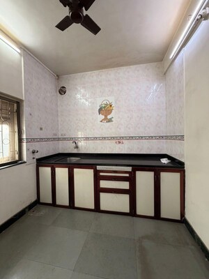 Kitchen in 1 BHK Apartment at Vidhyut CHS, Dombivli West – for Sale