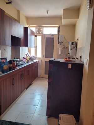 Kitchen in 2 BHK Apartment at RAS Palm Residency, Sector 76 – for Rent