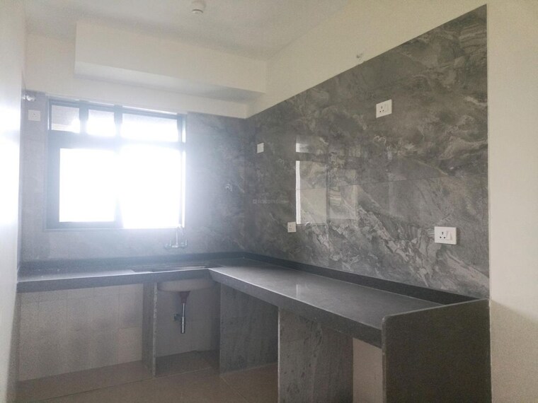Kitchen, ajmera-aeon 2 Bedroom 902 Sq.Ft. Apartment In Bhakti Park Mumbai 10700821