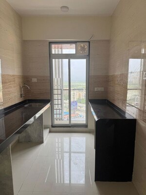Kitchen in 1 BHK Apartment at JVM Twin Tower, Kasarvadavali – for Rent
