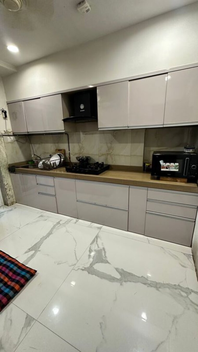 Kitchen, rna-ng-eclat 2 Bedroom 820 Sq.Ft. Apartment In Andheri West Mumbai 10700954