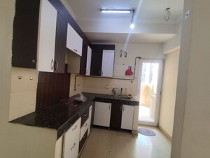Kitchen in 2 BHK Apartment at Paramount Floraville, Sector 137 – for Rent