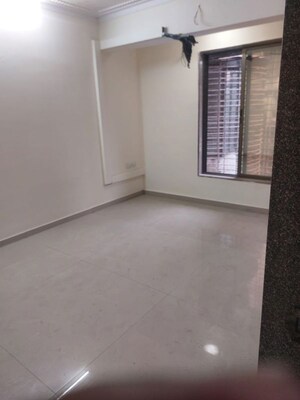 Room in 2 BHK Apartment at Swapnalok Towers, Malad East – for Sale