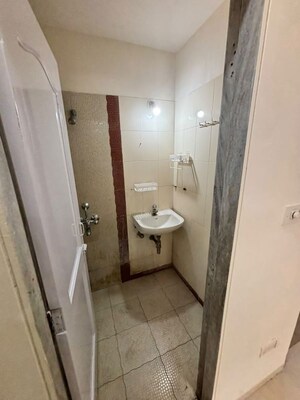 Bathroom in 2 BHK Apartment at Suraj Heritage, Owale – for Rent