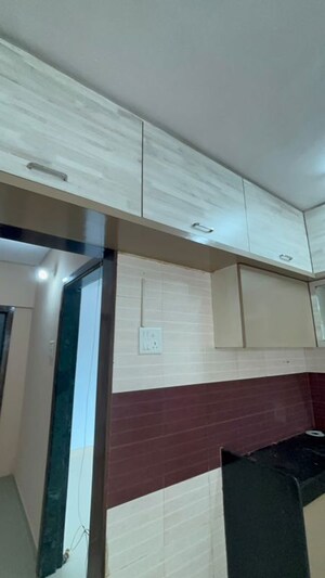 Kitchen in 2 BHK Apartment at Suraj Heritage, Owale – for Rent