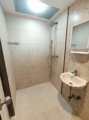 Bathroom in 1 BHK Apartment at Agarwal Trinity Towers, Malad West – for Rent
