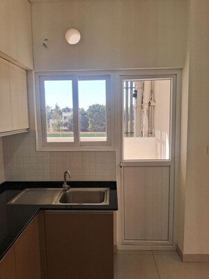 Kitchen in 2 BHK Apartment at Adarsh Greens, Kogilu – for Rent
