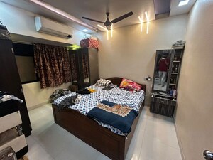 Bedroom in 2 BHK Apartment at Pushpak CHS, Kharghar Sector 11 – for Rent