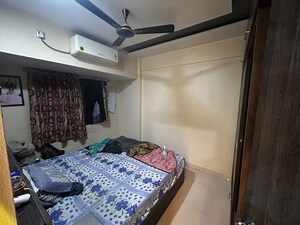 Bedroom in 2 BHK Apartment at Pushpak CHS, Kharghar Sector 11 – for Rent