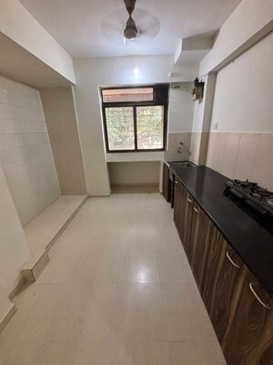 Kitchen in 2 BHK Apartment at Vijay Vatika, Kavesar – for Sale