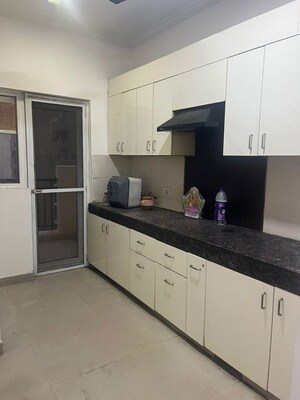 Kitchen in 3 BHK Apartment at Paramount Floraville, Sector 137 – for Rent