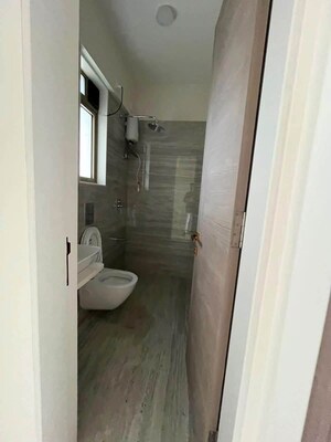Bathroom in 2 BHK Apartment at Crystal Hitendra Dhamm Shabha CHS, Goregaon West – for Rent