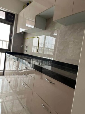 Kitchen in 2 BHK Apartment at Crystal Hitendra Dhamm Shabha CHS, Goregaon West – for Rent