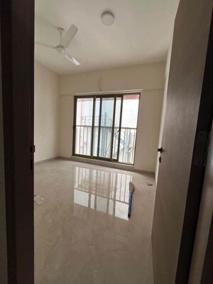 Bedroom in 2 BHK Apartment at Crystal Hitendra Dhamm Shabha CHS, Goregaon West – for Rent