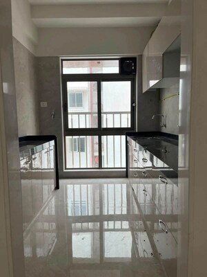 Kitchen in 2 BHK Apartment at Crystal Hitendra Dhamm Shabha CHS, Goregaon West – for Rent