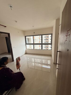 Living Room in 1 BHK Apartment at Piramal Vaikunth, Balkum Pada – for Rent