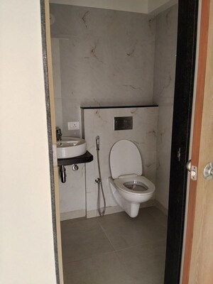 Bathroom in 1 BHK Apartment at MICL Aaradhya Parkwood, Mira Road – for Rent