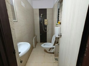 Bathroom in 1 BHK Apartment at Raunak Delight, Owale – for Rent