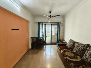 Living Room in 1 BHK Apartment at Raunak Delight, Owale – for Rent
