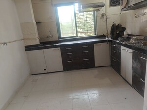 Kitchen in 2 BHK Apartment at Sea Breeze Tower, Nerul – for Rent