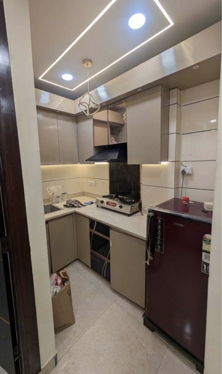 Kitchen, tagore garden 2 Bedroom 100 Sq.Ft. Builder Floor In Tagore Garden Delhi 10701413