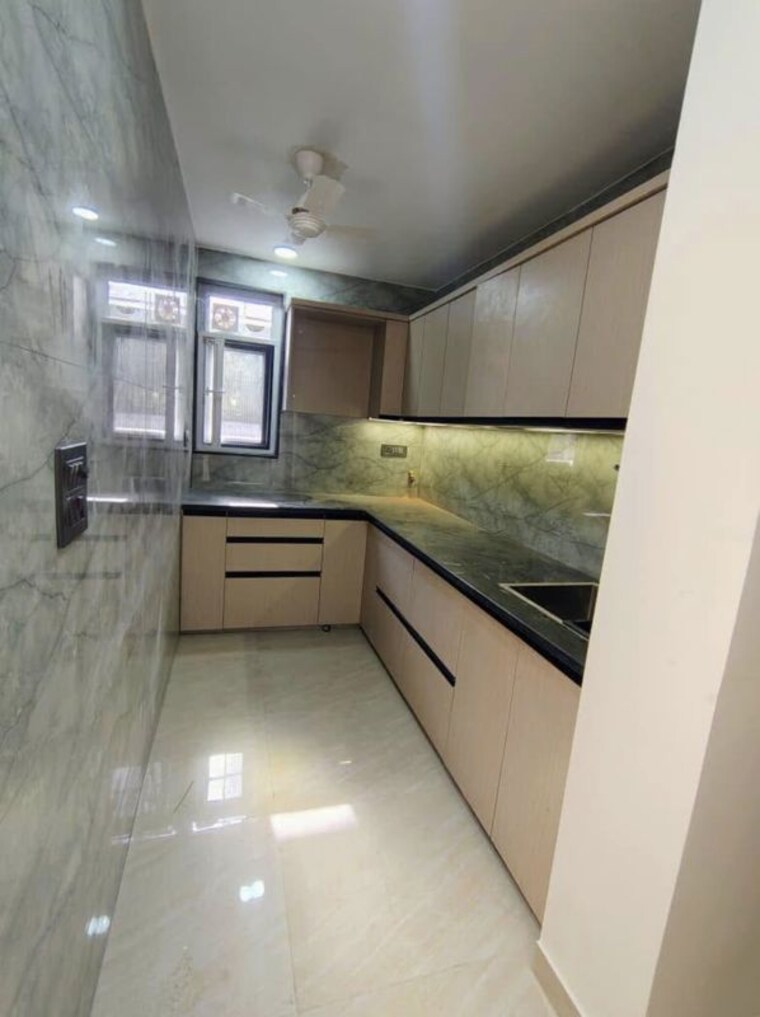 Kitchen, rajouri garden 3 Bedroom 130 Sq.Yd. Builder Floor In Rajouri Garden Delhi 10701447