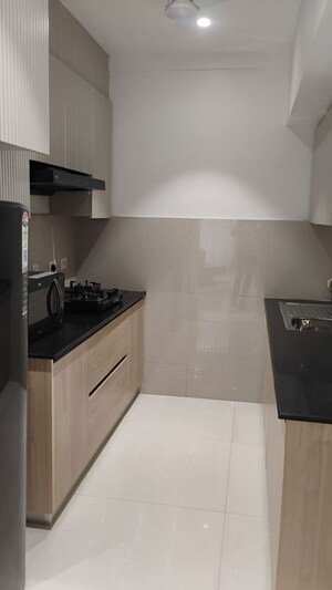 Kitchen in 3 BHK Apartment at Eldeco Latitude 27, Iim Road – for Sale