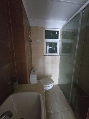 Bathroom in 3 BHK Apartment at Mahagun Moderne, Sector 78 – for Sale
