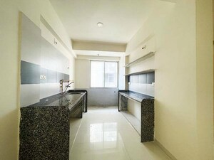 Kitchen in 2 BHK Apartment at Nava Naroda – for Sale