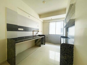 Kitchen in 2 BHK Apartment at Nava Naroda – for Sale