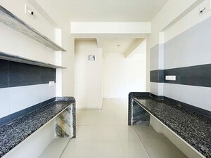 Kitchen in 2 BHK Apartment at Nava Naroda – for Sale