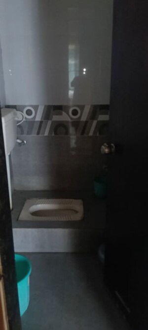 Bathroom in 1 BHK Apartment at Caratlane Marigold, Tathawade – for Sale