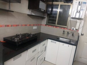 Kitchen in 2 BHK Apartment at Gulmohar Goldcoast, Kharadi – for Rent