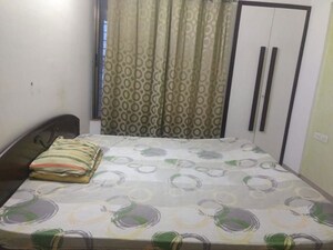 Bedroom in 2 BHK Apartment at Gulmohar Goldcoast, Kharadi – for Rent