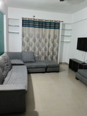 Living Room in 2 BHK Apartment at Gulmohar Goldcoast, Kharadi – for Rent
