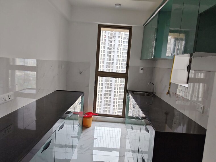 Kitchen, raymond-ten-x-habitat 2 Bedroom 640 Sq.Ft. Apartment In Pokhran Road No Two Thane 10701676