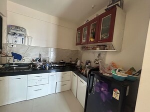 Kitchen in 2 BHK Apartment at Kohinoor Zen Estate, Kharadi – for Rent