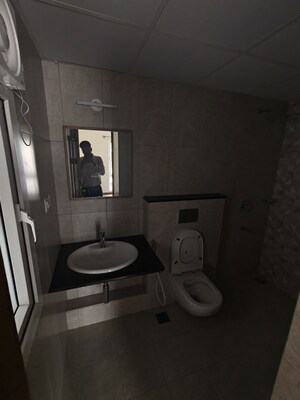 Bathroom in 2 BHK Apartment at Brigade Horizon, Kambipura – for Rent