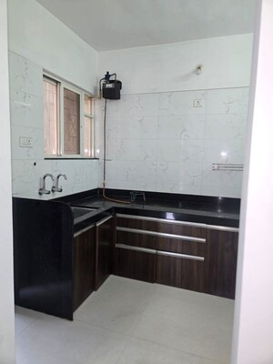 Kitchen in 1 BHK Apartment at GK Jhulelal Towers, Pimple Gurav – for Rent