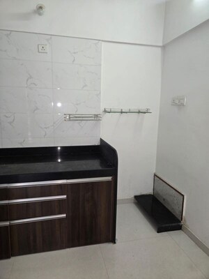 Kitchen in 1 BHK Apartment at GK Jhulelal Towers, Pimple Gurav – for Rent