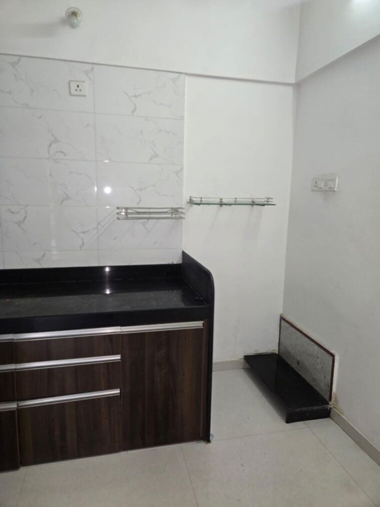 Kitchen, gk-jhulelal-towers 1 Bedroom 609 Sq.Ft. Apartment In Pimple Gurav Pune 10701847