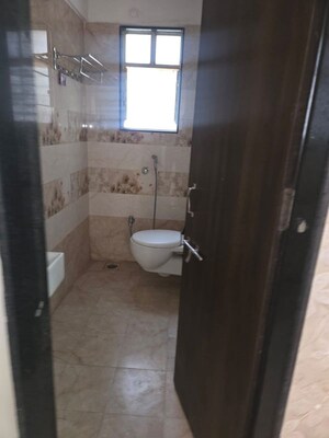 Bathroom in 1 BHK Apartment at GK Jhulelal Towers, Pimple Gurav – for Rent