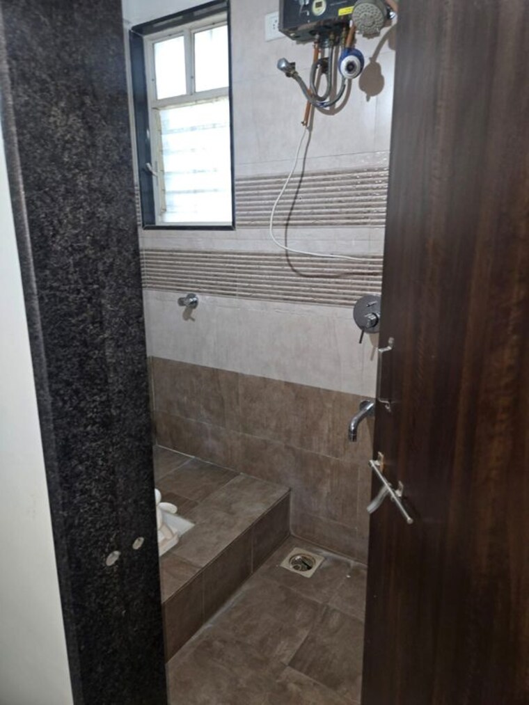 Bathroom, gk-jhulelal-towers 1 Bedroom 609 Sq.Ft. Apartment In Pimple Gurav Pune 10701847